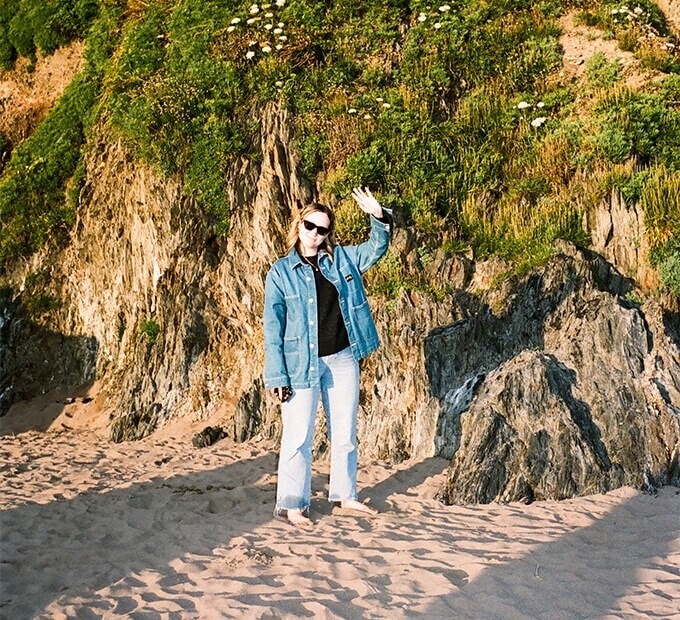 Women waving on the beach